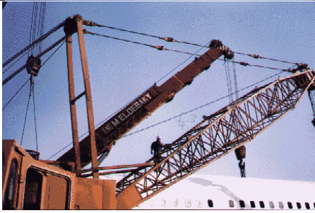 Transporting and lifting a passenger plane Using 3 cranes